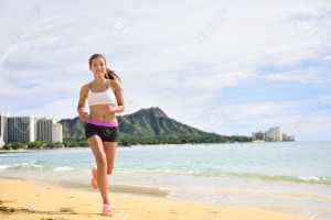 an-jogging-on-beach-run-female-athlete-runner-jogger-training-living-health-stock-photo